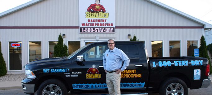 Founder and President David Brown outside the StayDry offices and truck in Flint Michigan