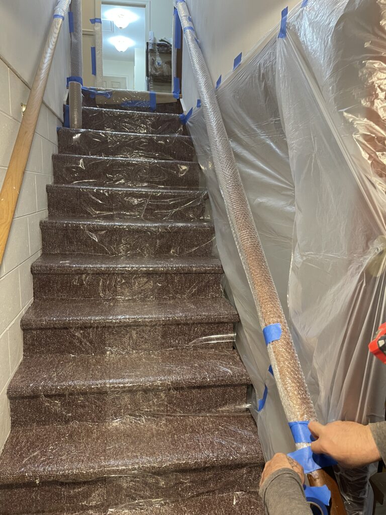 Carpeted Stairs Are Protected With Plastic